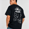 Camiseta negra con diseño gráfico de un rostro y un mono levantando pesas en la espalda, texto 'So Good'.