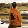 Sudadera Unisex New Year de Loco Monky Mustard by LOCO MONKY
