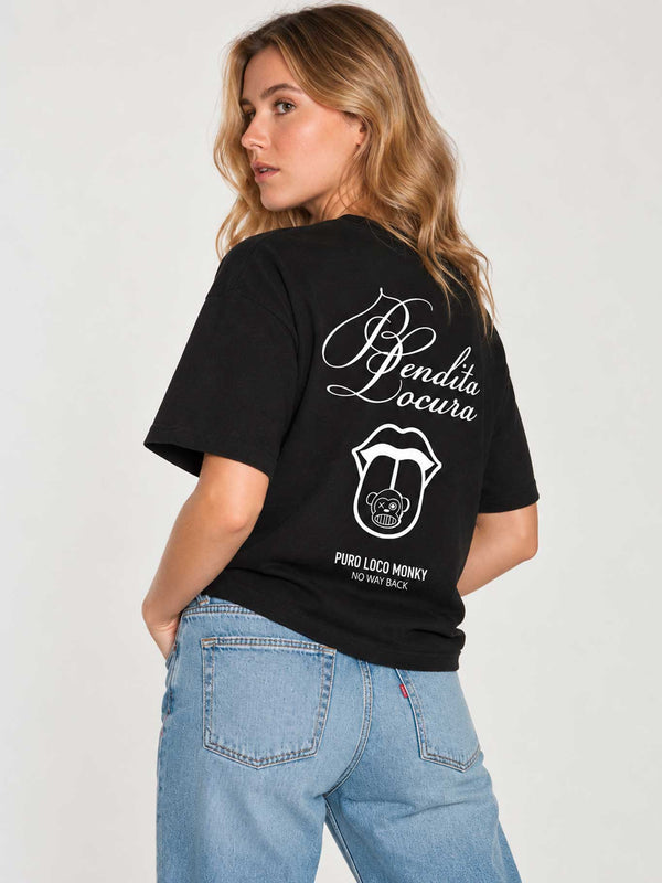 Camiseta negra de mujer con diseño en la espalda que dice 'Bendita Locura' y logo de Loco Monky.