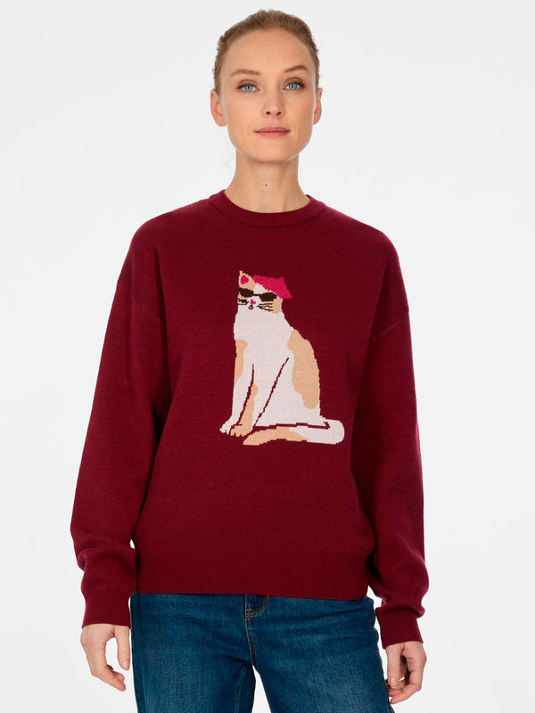 Jersey de mujer color vino con diseño de un gato sentado y un sombrero en el pecho.