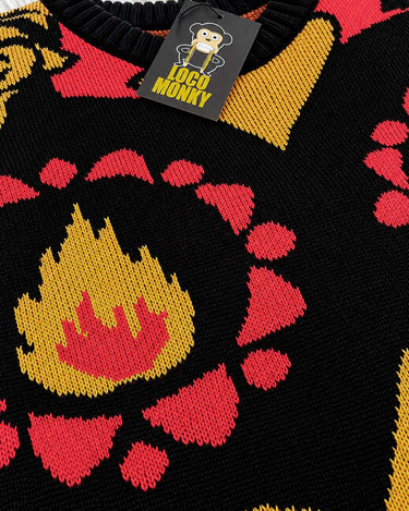 Jersey negro con diseño colorido de llamas y formas geométricas, etiqueta visible de Loco Monky