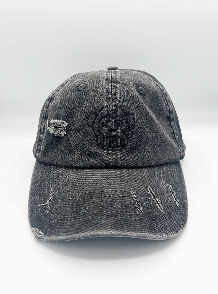 Gorra unisex efecto desgastado Raven de Loco Monky, ideal para un estilo moderno y vintage en cualquier ocasión.