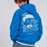 Sudadera azul con capucha, diseño gráfico en la parte posterior con un personaje y monos, marca Loco Monky.
