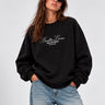 Sudadera negra oversize con bordado en blanco que dice 'Bendita Locura' y logo de Loco Monky